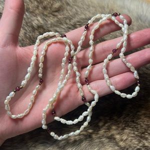 Cultured pearl necklace with red garnet beads